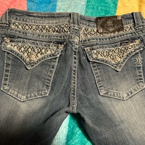 Miss Me Boot Cut rhinestone jeans.